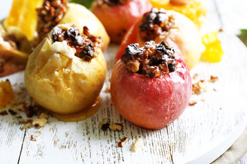 Baked apples on table close up