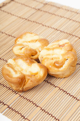 Loaf of bread on wooden plate