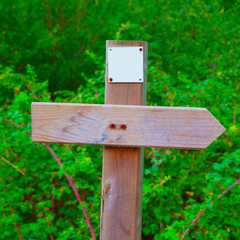 Sign with directional arrow