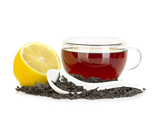 cup of tea with lemon and black tea isolated on white background