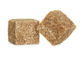 Brown sugar  cubes, isolated on white background