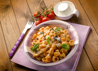 pasta with eggplant tomatoes ricotta and parmesan cheese