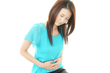 腹痛を訴える女性