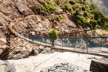 Crossing the suspension bridge
