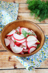 Obraz na płótnie Canvas salad of radishes in a bowl