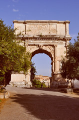 Fototapeta na wymiar Retro look Arch of Titus in Rome