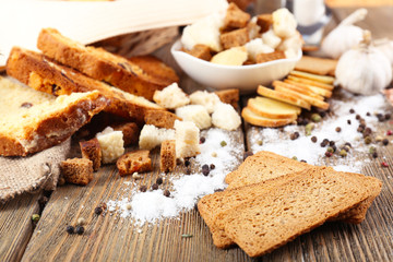 Homemade croutons on table in kitchen, close up