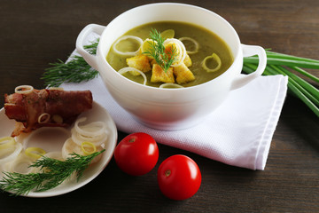 Leek soup on table, close up