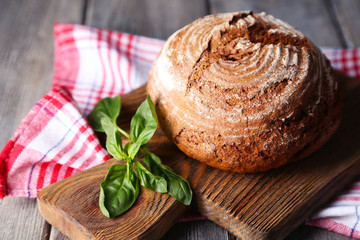 Obraz na płótnie Canvas Fresh baked bread and fresh basil