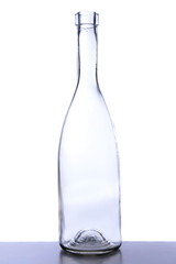 Empty glass bottle isolated on white