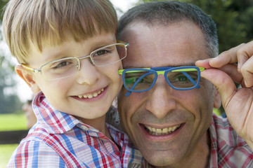 father and son play together