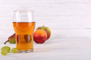 tasty summer drink with fresh fruits, on wooden table