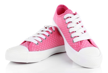 Pink trainers isolated on white