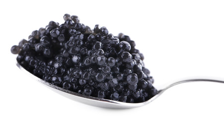 Black caviar in spoon isolated on white