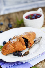 Breakfast, croissant with blueberries
