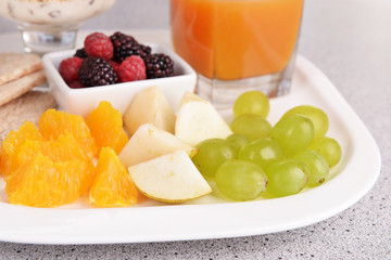 Slices of fruits with berries
