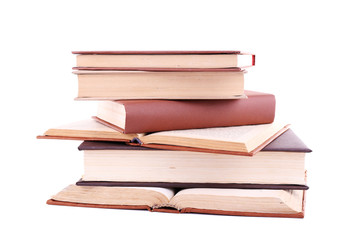 Books in a mess isolated on white