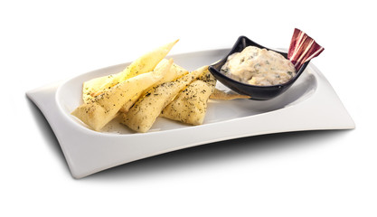 nachos, tortilla with yoghurt sauce and pickles