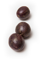 Passion fruit ioslated on a white studio background.