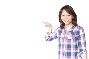 Young smiling Japanese woman pointing her finger
