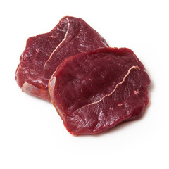 Zebra steaks isolated on a white studio background,