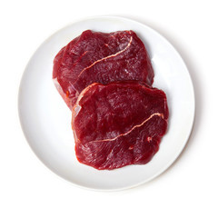 Exotic Zebra steaks isolated on a white studio background,