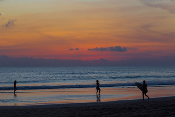 Surfer at Sunset Time