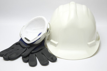 Safety gear kit close up over white background