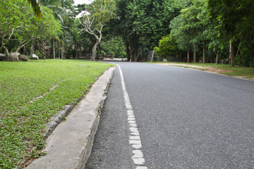 Fototapeta na wymiar Asphalt road texture with left white stripe