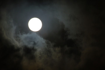 Fototapeta na wymiar Moon in the rain cloud