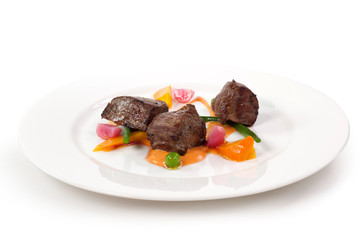 tre cubi di carne al forno