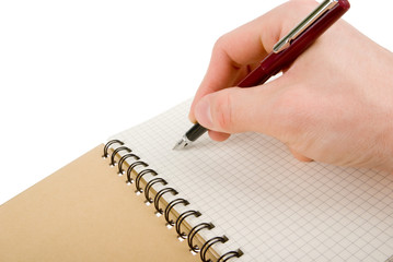 Hand writing on empty notepad (notebook) isolated on white