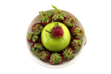 Juicy strawberry with green apple. Isolated object.