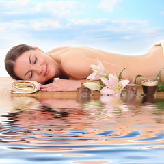 young healthy girl relaxing in spa