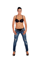 Attractive brunette woman in bra with jeans