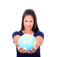 Portrait of beautiful young woman holding globe in hands against