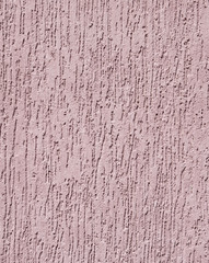 Violet relief plaster on wall closeup