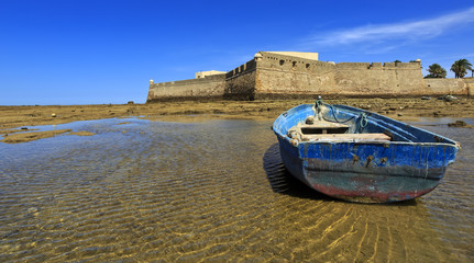 Castle of Santa Catalina with aged ship on forefront, Cadiz © Fulcanelli