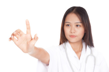 Young Asian female doctor touch a screen