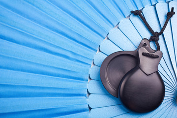 Blue Spanish flamenco fan with black castanets