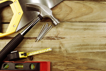 Carpentry tools on wood. Copy space
