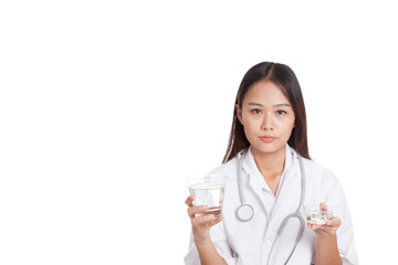 Young Asian female doctor with water and medicine