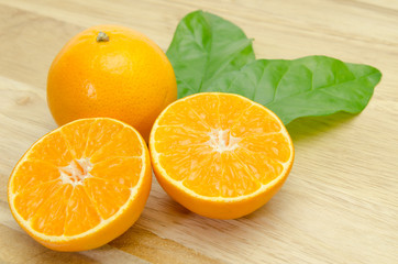 orange sliced on chopping board background