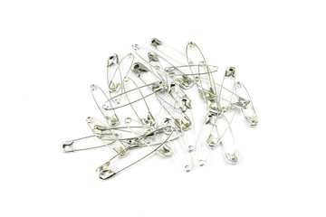 Fototapeta premium safety pins on white background