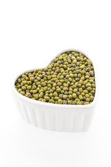 Green mung beans isolated on white background