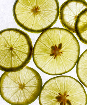 Some lime slices on white
