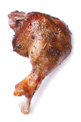 Roasted duck leg isolated on white background close-up.