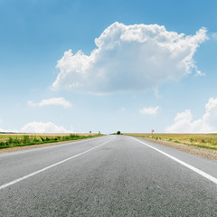 cloud over asphalt road