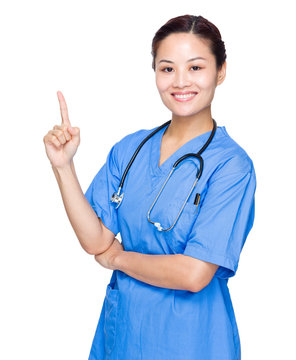 Female Doctor With Finger Point Up