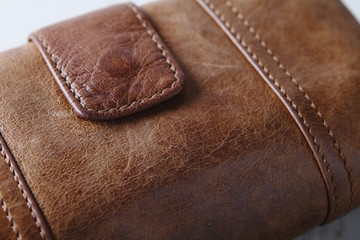 Brown leather purse wallet close up